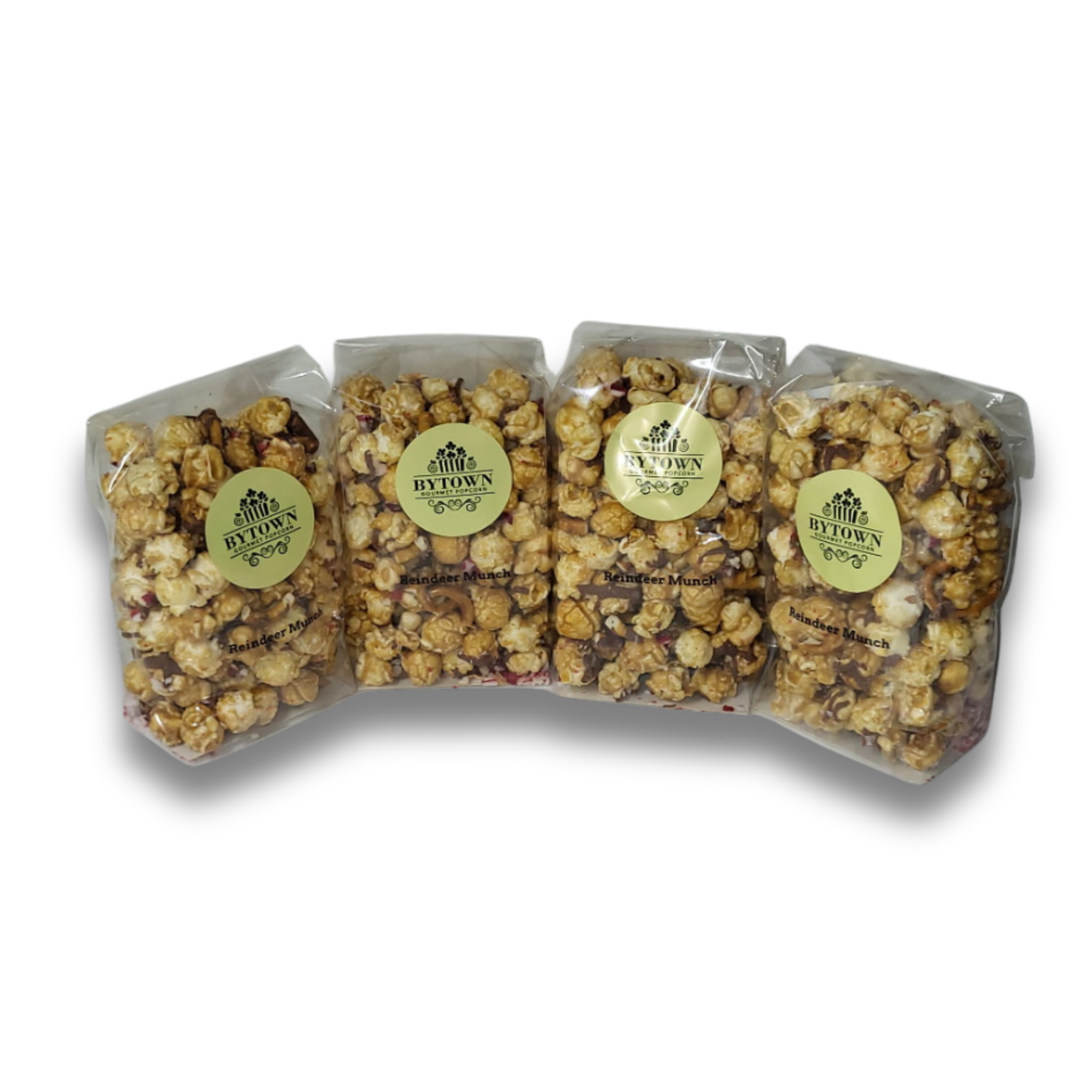 Reindeer Munch popcorn with pretzels, crushed candy cane and Callebaut milk chocolate drizzles over top