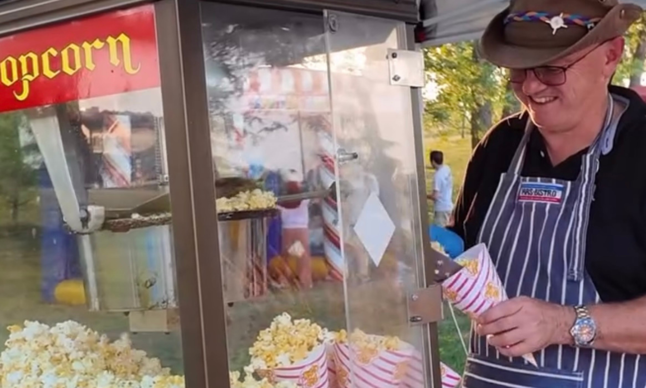 Peter, owner of Ottawa Cotton Candy popping popcorn